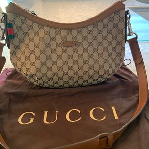 Gucci Medium Saddle Zip Shoulder Bag.